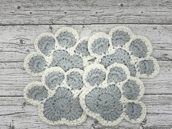 Crocheted Paw Coasters - Image 1