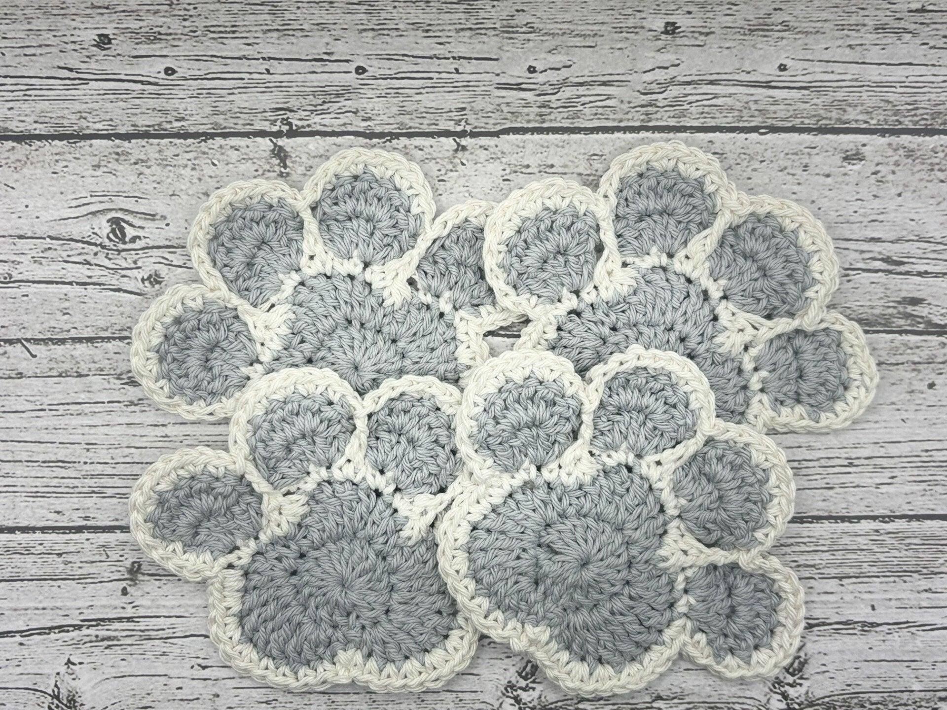Crocheted Paw Coasters - Image 1